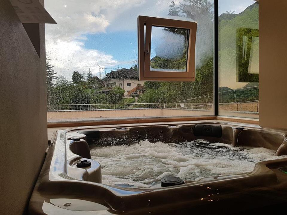 Aparthotel Malga Caldaro Esterno foto